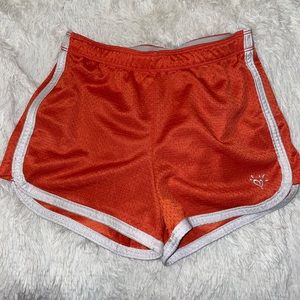Orange Justice shorts for kids. Size 10